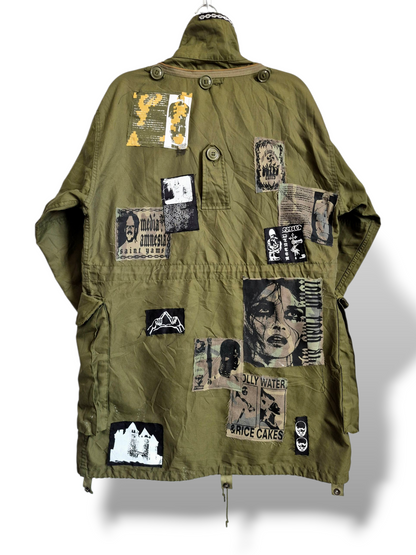 '𝘏𝘢𝘶𝘯𝘵𝘦𝘥 𝘛𝘶𝘯𝘥𝘳𝘢' Military Trench Shell Jacket
