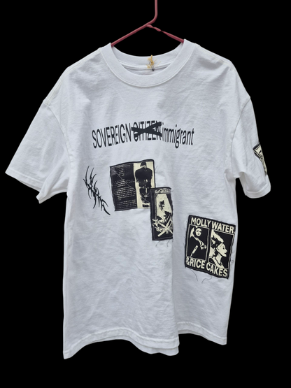 '𝘚𝘰𝘷𝘦𝘳𝘦𝘪𝘨𝘯 𝘐𝘮𝘮𝘪𝘨𝘳𝘢𝘯𝘵' Tee